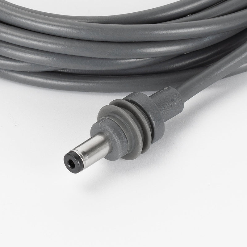 Car Charger Cable in Use in SUV, Truck, or RV Cigarette Lighter Socket for Off-Grid Power Solution.
